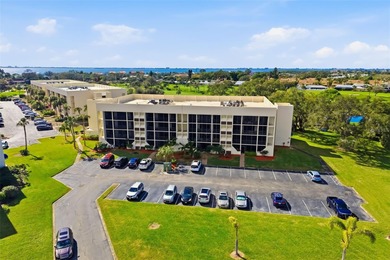 Step inside this beautifully remodeled 3rd-floor, 2-bedroom on IMG Academies Golf and Country Club in Florida - for sale on GolfHomes.com, golf home, golf lot