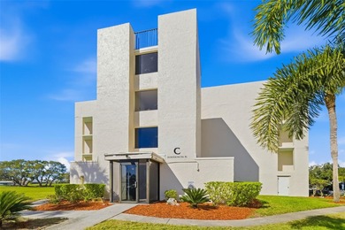 Step inside this beautifully remodeled 3rd-floor, 2-bedroom on IMG Academies Golf and Country Club in Florida - for sale on GolfHomes.com, golf home, golf lot