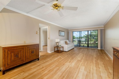 Step inside this beautifully remodeled 3rd-floor, 2-bedroom on IMG Academies Golf and Country Club in Florida - for sale on GolfHomes.com, golf home, golf lot