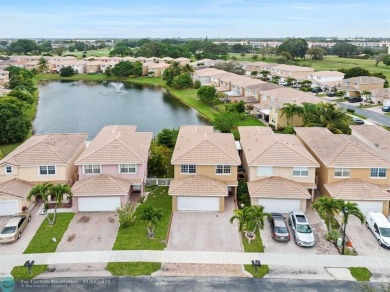 Spectacular LAKE VIEWS from this 4 bedroom 2.5 bath home located on Inverrary Country Club in Florida - for sale on GolfHomes.com, golf home, golf lot