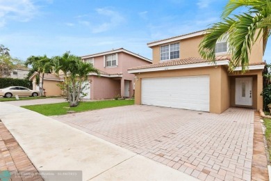 Spectacular LAKE VIEWS from this 4 bedroom 2.5 bath home located on Inverrary Country Club in Florida - for sale on GolfHomes.com, golf home, golf lot