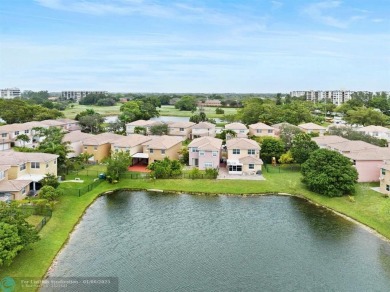 Spectacular LAKE VIEWS from this 4 bedroom 2.5 bath home located on Inverrary Country Club in Florida - for sale on GolfHomes.com, golf home, golf lot