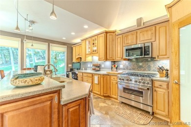 Welcome to this stunning home designed for luxurious living in on Seasons Ridge At Four Seasons in Missouri - for sale on GolfHomes.com, golf home, golf lot