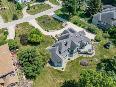Perched on a premium .71-acre lot with breathtaking Sycamore on Sycamore Hills Golf Club in Indiana - for sale on GolfHomes.com, golf home, golf lot