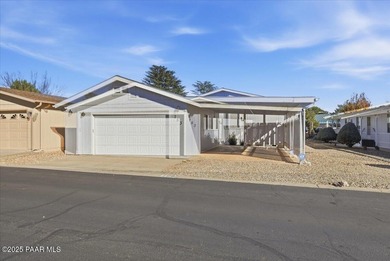 Discover exceptional value in this spacious, well-maintained on Quail Wood Greens Golf Course in Arizona - for sale on GolfHomes.com, golf home, golf lot