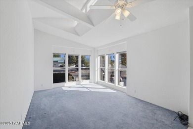 Discover exceptional value in this spacious, well-maintained on Quail Wood Greens Golf Course in Arizona - for sale on GolfHomes.com, golf home, golf lot