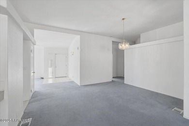 Discover exceptional value in this spacious, well-maintained on Quail Wood Greens Golf Course in Arizona - for sale on GolfHomes.com, golf home, golf lot