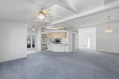 Discover exceptional value in this spacious, well-maintained on Quail Wood Greens Golf Course in Arizona - for sale on GolfHomes.com, golf home, golf lot