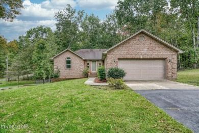 This beautiful brick BASEMENT RANCH home, nestled on 2 lots in on Lake Tansi Village Country Club in Tennessee - for sale on GolfHomes.com, golf home, golf lot