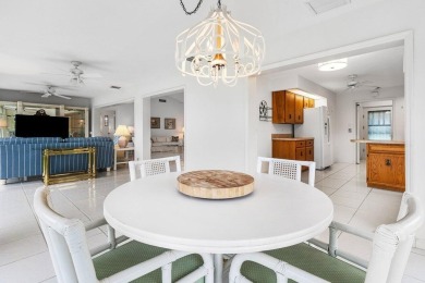 This inviting 3-bedroom, 3 and 1/2 bathroom home  perfect blend on Quail Ridge Golf Course and Country Club in Florida - for sale on GolfHomes.com, golf home, golf lot