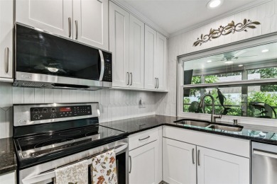 The minute you walk through the door of this gorgeous Highland on Highland Lakes Executive Golf Course in Florida - for sale on GolfHomes.com, golf home, golf lot