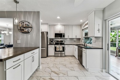 The minute you walk through the door of this gorgeous Highland on Highland Lakes Executive Golf Course in Florida - for sale on GolfHomes.com, golf home, golf lot