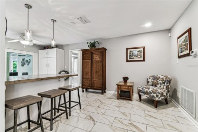 The minute you walk through the door of this gorgeous Highland on Highland Lakes Executive Golf Course in Florida - for sale on GolfHomes.com, golf home, golf lot