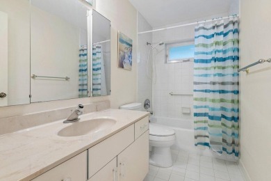 This inviting 3-bedroom, 3 and 1/2 bathroom home  perfect blend on Quail Ridge Golf Course and Country Club in Florida - for sale on GolfHomes.com, golf home, golf lot