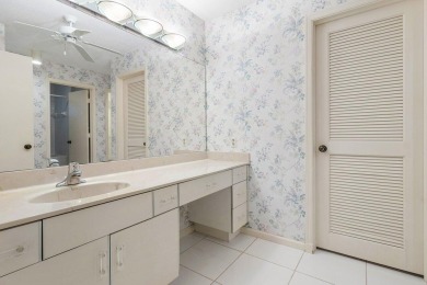 This inviting 3-bedroom, 3 and 1/2 bathroom home  perfect blend on Quail Ridge Golf Course and Country Club in Florida - for sale on GolfHomes.com, golf home, golf lot