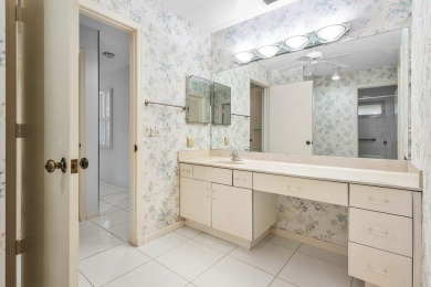 This inviting 3-bedroom, 3 and 1/2 bathroom home  perfect blend on Quail Ridge Golf Course and Country Club in Florida - for sale on GolfHomes.com, golf home, golf lot