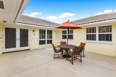 This inviting 3-bedroom, 3 and 1/2 bathroom home  perfect blend on Quail Ridge Golf Course and Country Club in Florida - for sale on GolfHomes.com, golf home, golf lot