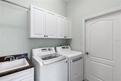 MAINTENANCE-FREE, TURNKEY-FURNISHED PATIO HOME: Located in the on Plantation Golf and Country Club in Florida - for sale on GolfHomes.com, golf home, golf lot