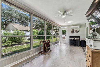 The minute you walk through the door of this gorgeous Highland on Highland Lakes Executive Golf Course in Florida - for sale on GolfHomes.com, golf home, golf lot