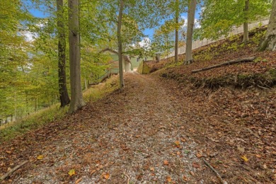 Lakehouse in private resort on Hide-A-Way Hills Golf Club in Ohio - for sale on GolfHomes.com, golf home, golf lot