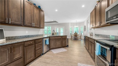 NEW CONSTRUCTION 2023 IN OAKWOOD HILLS ESTATES! One level home on Bayview Golf Course in Missouri - for sale on GolfHomes.com, golf home, golf lot
