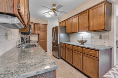 Enjoy carefree condo living with golf course views and on Cascades Golf Course in Michigan - for sale on GolfHomes.com, golf home, golf lot