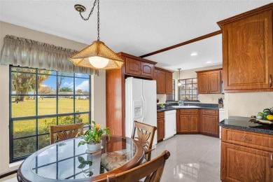 This exceptional villa home features wide golf course views and on Highland Lakes Executive Golf Course in Florida - for sale on GolfHomes.com, golf home, golf lot