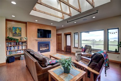Welcome to this beautiful custom-built home in the Mission Bay on Polson Bay Golf Course - Championship Course in Montana - for sale on GolfHomes.com, golf home, golf lot