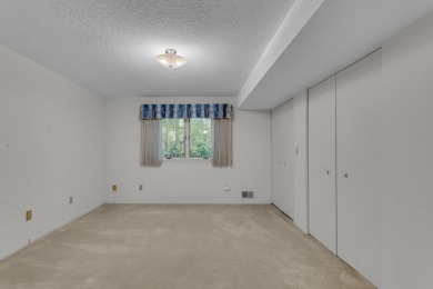 Enjoy carefree condo living with golf course views and on Cascades Golf Course in Michigan - for sale on GolfHomes.com, golf home, golf lot
