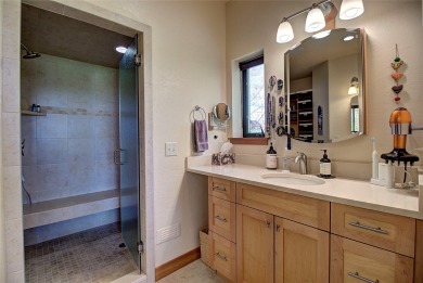 Welcome to this beautiful custom-built home in the Mission Bay on Polson Bay Golf Course - Championship Course in Montana - for sale on GolfHomes.com, golf home, golf lot