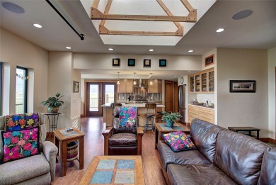 Welcome to this beautiful custom-built home in the Mission Bay on Polson Bay Golf Course - Championship Course in Montana - for sale on GolfHomes.com, golf home, golf lot