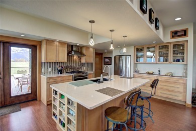 Welcome to this beautiful custom-built home in the Mission Bay on Polson Bay Golf Course - Championship Course in Montana - for sale on GolfHomes.com, golf home, golf lot