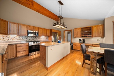 This home reflects a deep appreciation for quality and comfort on Cedar River Golf Course in Michigan - for sale on GolfHomes.com, golf home, golf lot