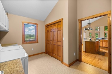 This home reflects a deep appreciation for quality and comfort on Cedar River Golf Course in Michigan - for sale on GolfHomes.com, golf home, golf lot