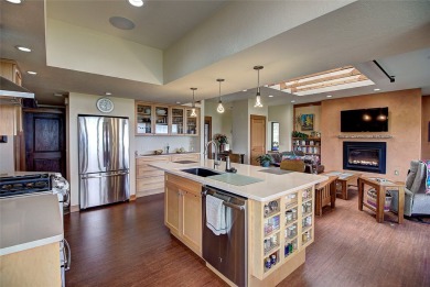 Welcome to this beautiful custom-built home in the Mission Bay on Polson Bay Golf Course - Championship Course in Montana - for sale on GolfHomes.com, golf home, golf lot