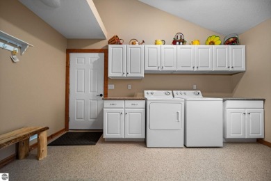 This home reflects a deep appreciation for quality and comfort on Cedar River Golf Course in Michigan - for sale on GolfHomes.com, golf home, golf lot