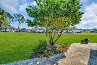 This exceptional villa home features wide golf course views and on Highland Lakes Executive Golf Course in Florida - for sale on GolfHomes.com, golf home, golf lot