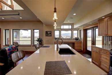 Welcome to this beautiful custom-built home in the Mission Bay on Polson Bay Golf Course - Championship Course in Montana - for sale on GolfHomes.com, golf home, golf lot