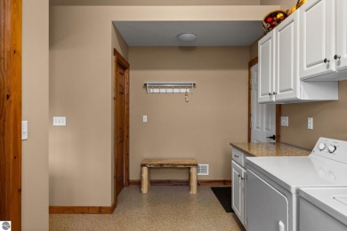 This home reflects a deep appreciation for quality and comfort on Cedar River Golf Course in Michigan - for sale on GolfHomes.com, golf home, golf lot