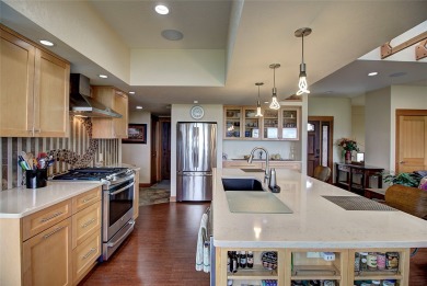 Welcome to this beautiful custom-built home in the Mission Bay on Polson Bay Golf Course - Championship Course in Montana - for sale on GolfHomes.com, golf home, golf lot
