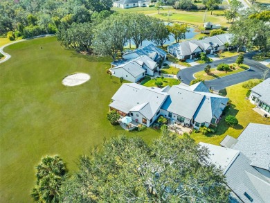 This exceptional villa home features wide golf course views and on Highland Lakes Executive Golf Course in Florida - for sale on GolfHomes.com, golf home, golf lot