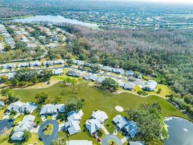 This exceptional villa home features wide golf course views and on Highland Lakes Executive Golf Course in Florida - for sale on GolfHomes.com, golf home, golf lot