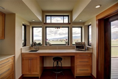 Welcome to this beautiful custom-built home in the Mission Bay on Polson Bay Golf Course - Championship Course in Montana - for sale on GolfHomes.com, golf home, golf lot