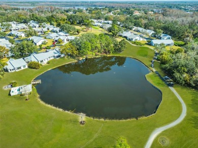 This exceptional villa home features wide golf course views and on Highland Lakes Executive Golf Course in Florida - for sale on GolfHomes.com, golf home, golf lot