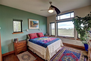Welcome to this beautiful custom-built home in the Mission Bay on Polson Bay Golf Course - Championship Course in Montana - for sale on GolfHomes.com, golf home, golf lot