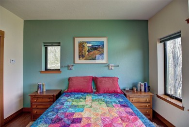 Welcome to this beautiful custom-built home in the Mission Bay on Polson Bay Golf Course - Championship Course in Montana - for sale on GolfHomes.com, golf home, golf lot