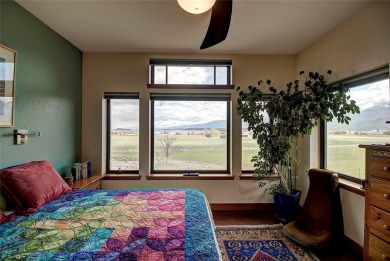 Welcome to this beautiful custom-built home in the Mission Bay on Polson Bay Golf Course - Championship Course in Montana - for sale on GolfHomes.com, golf home, golf lot