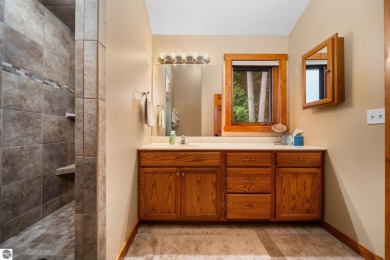 This home reflects a deep appreciation for quality and comfort on Cedar River Golf Course in Michigan - for sale on GolfHomes.com, golf home, golf lot