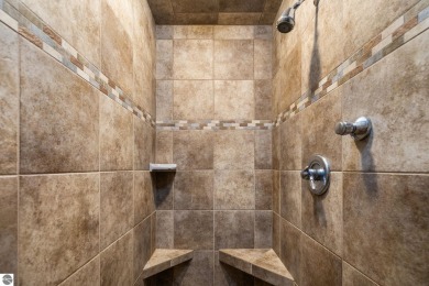 This home reflects a deep appreciation for quality and comfort on Cedar River Golf Course in Michigan - for sale on GolfHomes.com, golf home, golf lot