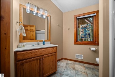 This home reflects a deep appreciation for quality and comfort on Cedar River Golf Course in Michigan - for sale on GolfHomes.com, golf home, golf lot